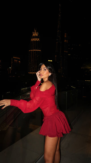 Elegant Long-Sleeve Oblique Shoulder Sheer Top and Skort Set