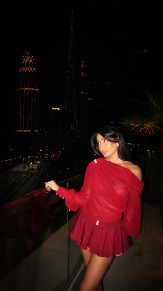 Elegant Long-Sleeve Oblique Shoulder Sheer Top and Skort Set