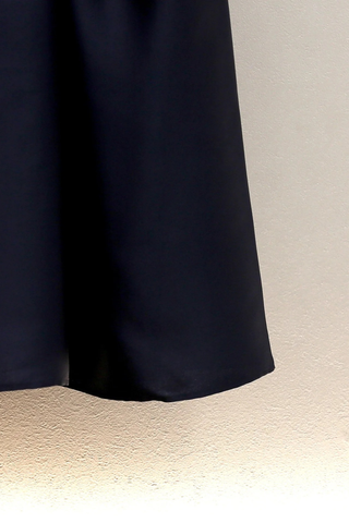 Long-Sleeve Knit Top With Belted Waist & Satin Maxi Skirt Design