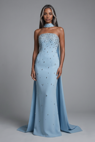 Crystal-Embellished Strapless Gown – Statement Neckline & Flowing Back Cape