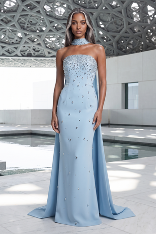 Crystal-Embellished Strapless Gown – Statement Neckline & Flowing Back Cape