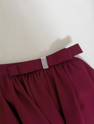 Elegant Long-Sleeve Oblique Shoulder Sheer Top and Skort Set