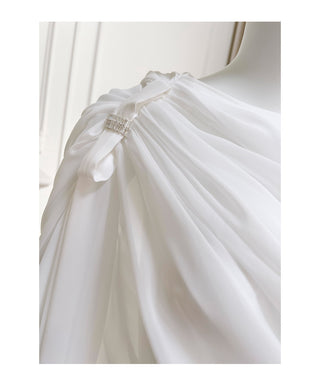 Elegant Long-Sleeve Oblique Shoulder Sheer Top and Skort Set