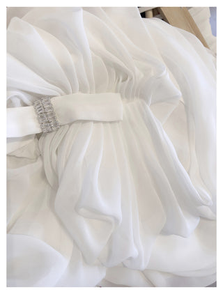 Elegant Long-Sleeve Oblique Shoulder Sheer Top and Skort Set